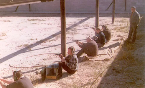 Early combat pistol shooting at the range