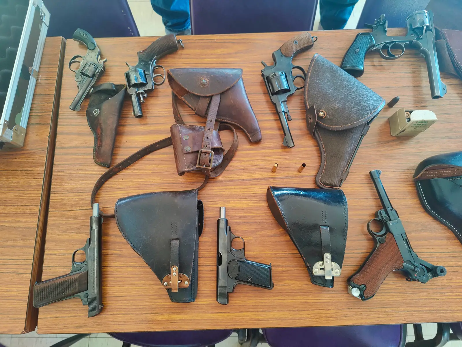 Historic pistols and holsters brought in by the CLDPC collectors group